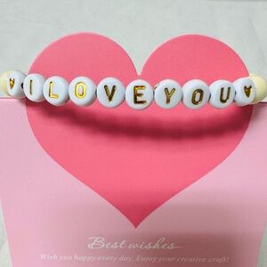 Elegant White and Gold Bracelet